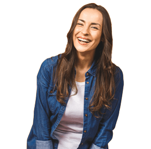 Happy cheerful young woman wearing her black hair in bun rejoicing at positive news or birthday gift, looking at camera with joyful and charming smile.