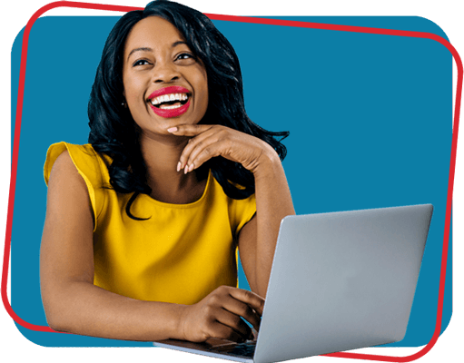 Portrait of a happy young smiling woman sitting behind desk and computer laptop, looking up.