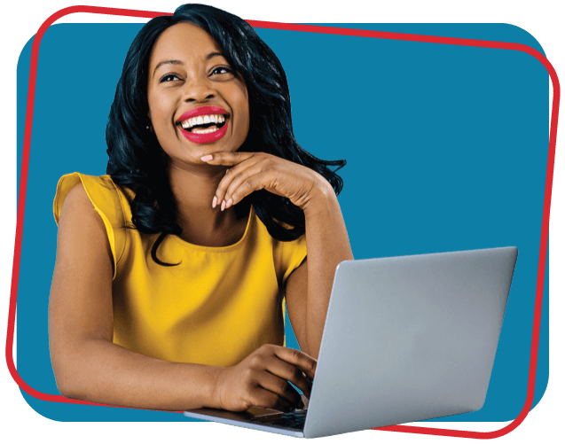 Portrait of a happy young smiling woman sitting behind desk and computer laptop, looking up.