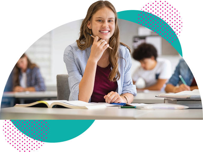 Student at desk in a classroom