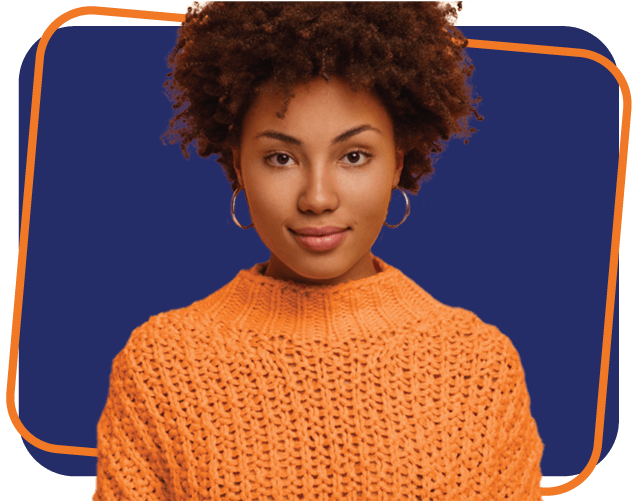 Portrait of Afro American millennial woman with calm serious face expression, looks directly at camera, wears knitted jumper, has natural beauty